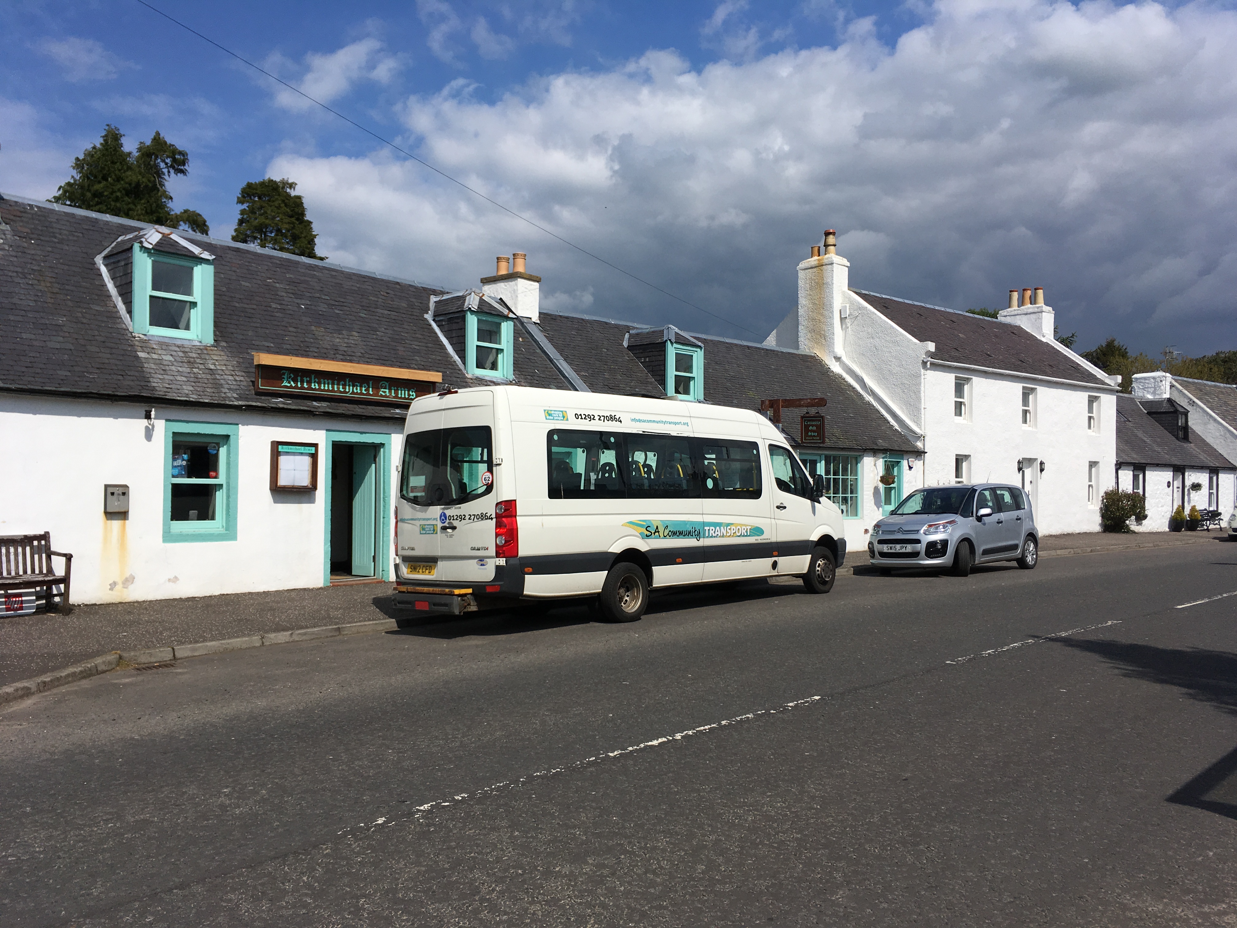 South AyrshireCommunity Transports SACT3 VW Crafter sits on a road outside a restaurant.